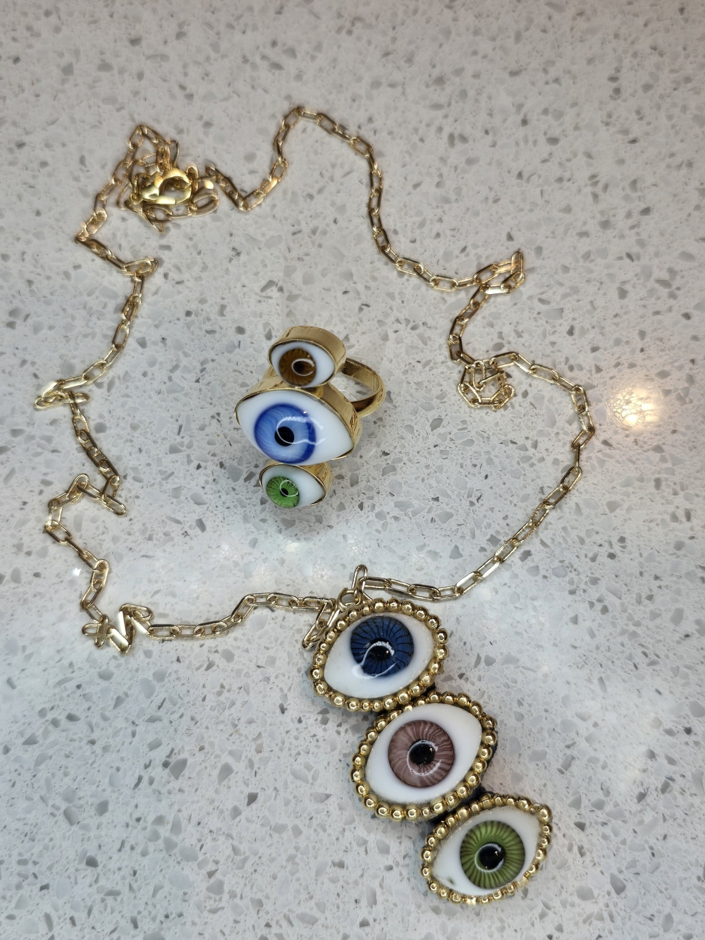 Gold Eye Pendant Necklace and Ring Set with Blue, Brown and Green Accents